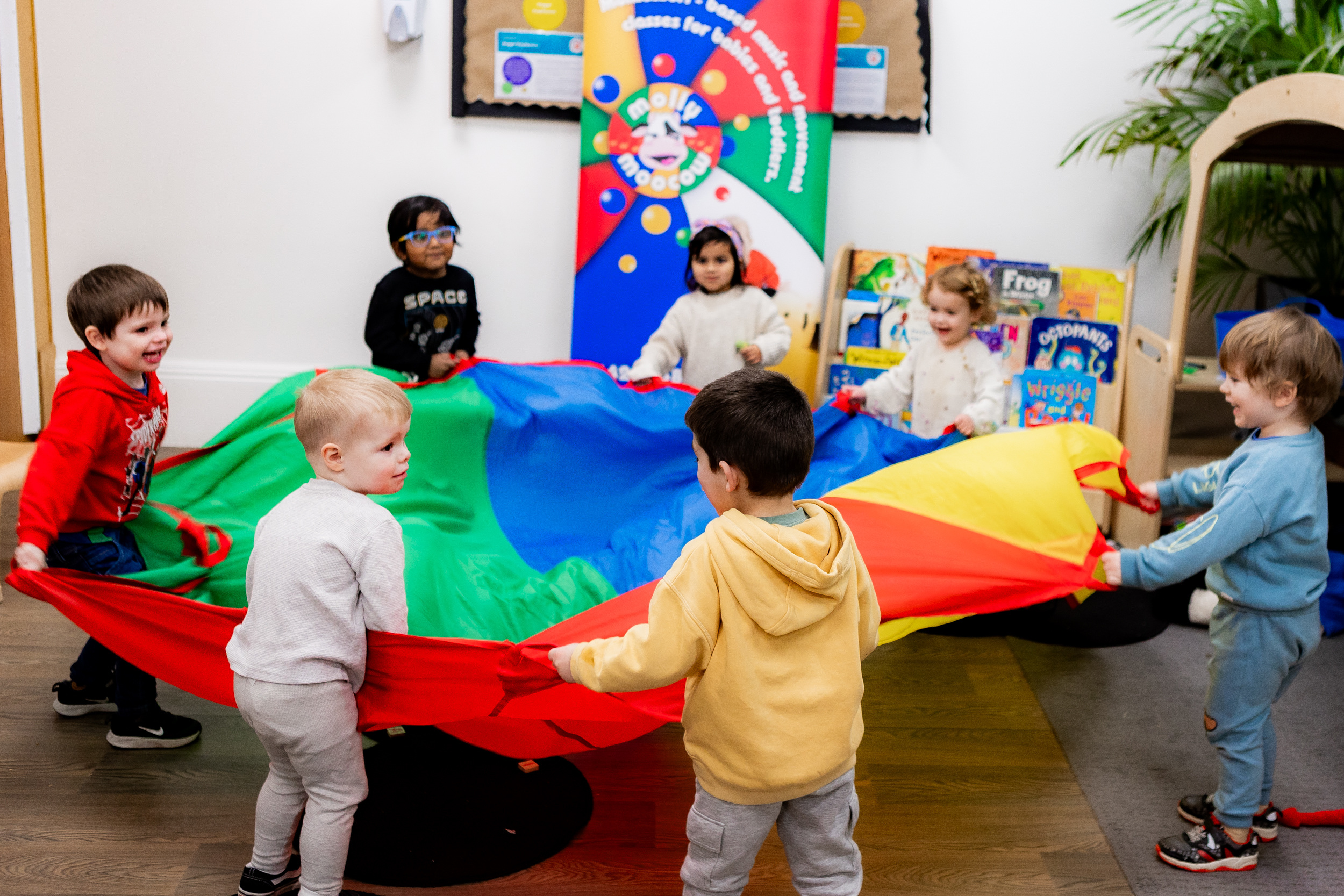 Children with a Parachute at a Molly Moocow class
