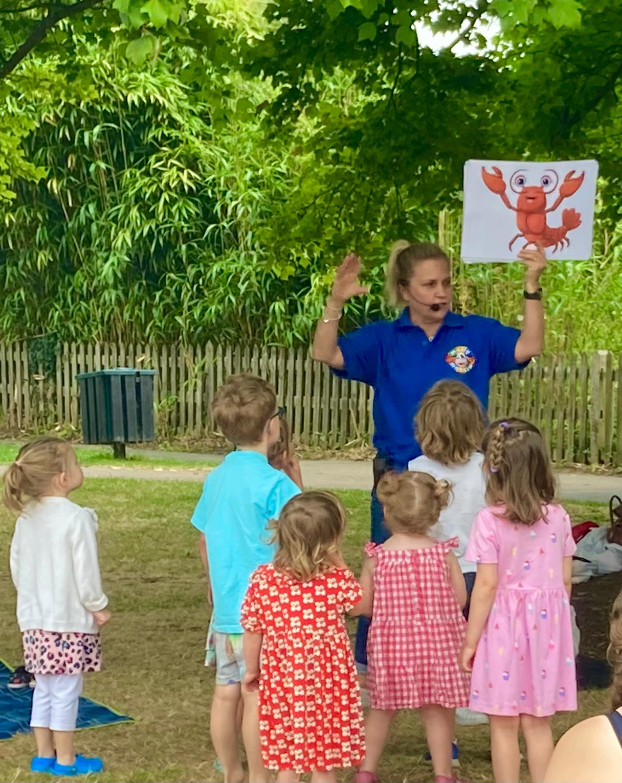 Children watching a Molly Moocow Outdoor Class